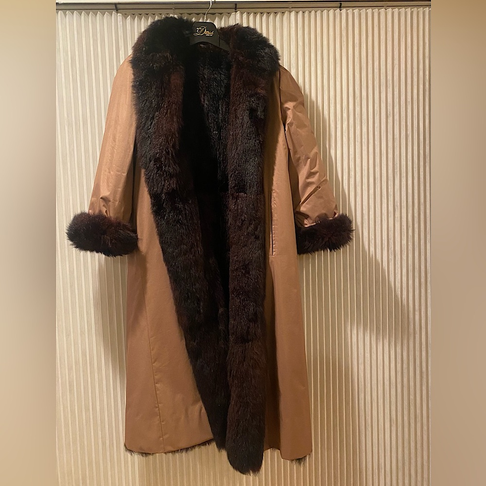 Authentic possum coat that is reversible to nylon rain silk